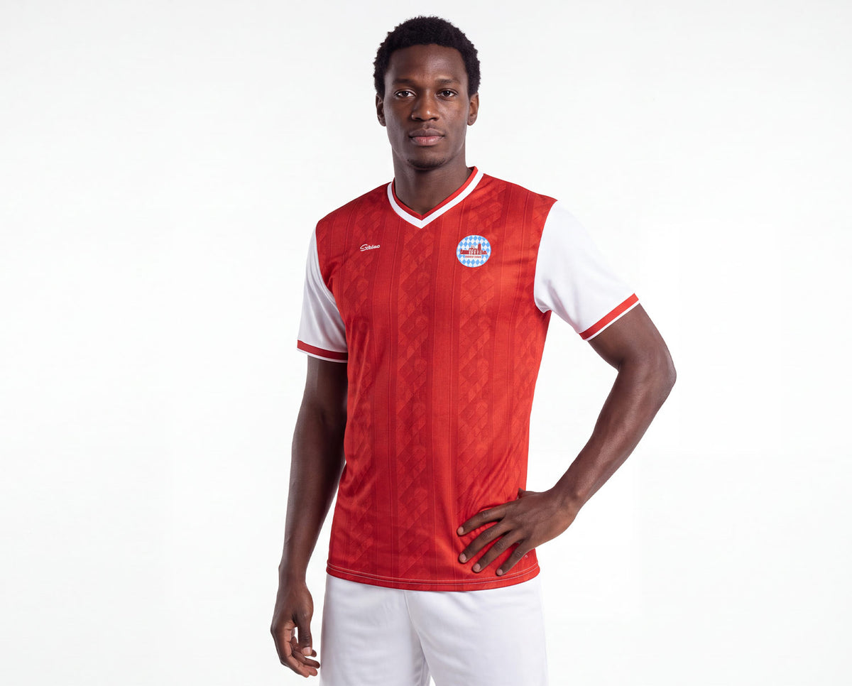 München Fan-Trikot 26/27 Heim "Unser Herz schlägt Rot" inkl. Name und Nummer (Druck)